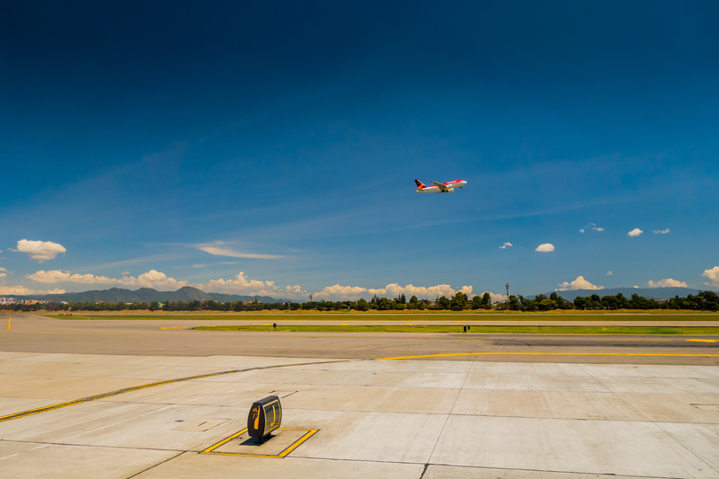 BOGOTA, COLOMBIA - MARCH 07, 2015: Departure flight Avianca airplane cruising the sky at international airport El Dorado airport in Bogota